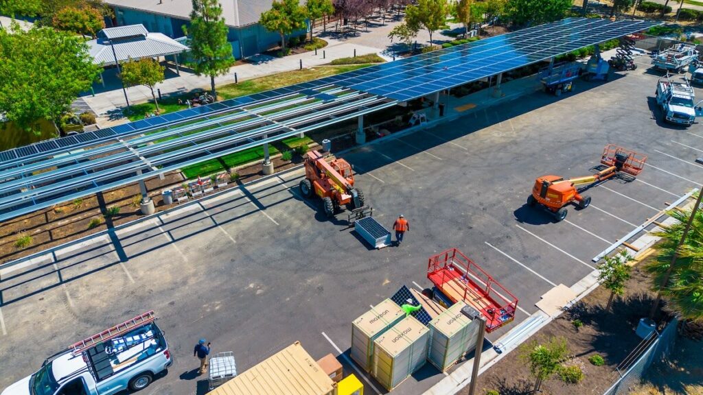 Aerial view of the parking lot of the Los Banos Community Center where solar panels are being installed